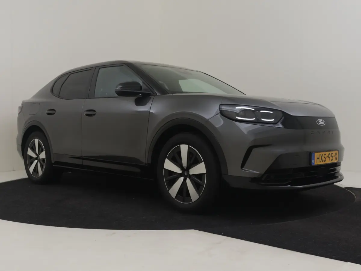 Select Extended Range RWD 77 kWh l Elektr. Stoel incl Memory l Stoel en Stuurverwarming l Head up Display l Camera l