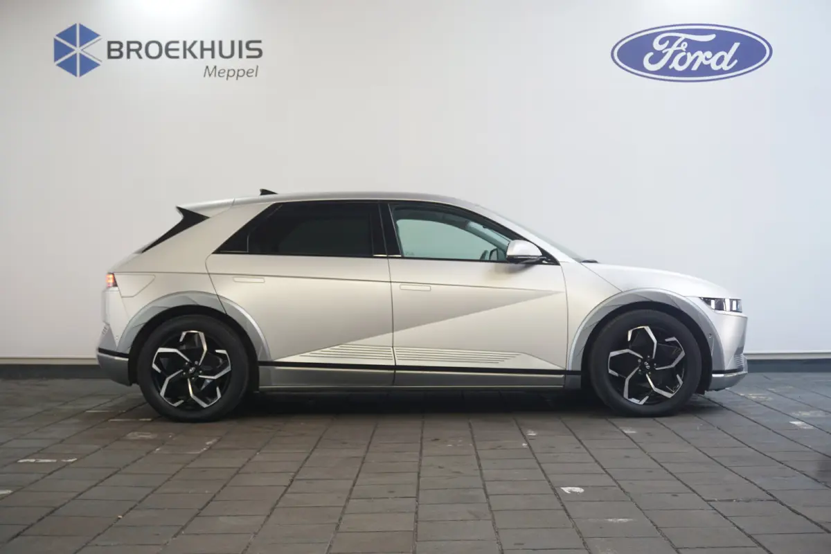 Lounge 77.4 kWh 100 SoH | 1600kg Trekgewicht | Cruise control adaptief met Stop&Go en stuurhulp | Dodehoekdetectie met correctie | Elektrisch bedienbare achterklep