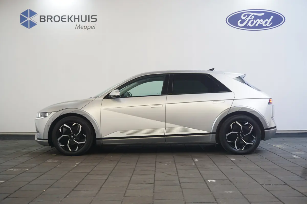 Lounge 77.4 kWh 100 SoH | 1600kg Trekgewicht | Cruise control adaptief met Stop&Go en stuurhulp | Dodehoekdetectie met correctie | Elektrisch bedienbare achterklep