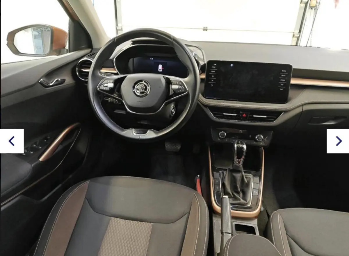 1.0 TSI Business Edition | DSG Automaat | Cruise control adaptief | Phoenix orange | Digitaal instrumentenpaneel | NL-Auto |