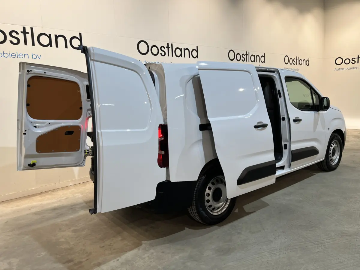 Premium Long 50 kWh / 100% elektrisch !! / SOH 95% / CCS Snelladen / Airco / Cruise Control / Camera / CarPlay / Navigatie / 3-Zits / 4.900 KM !!