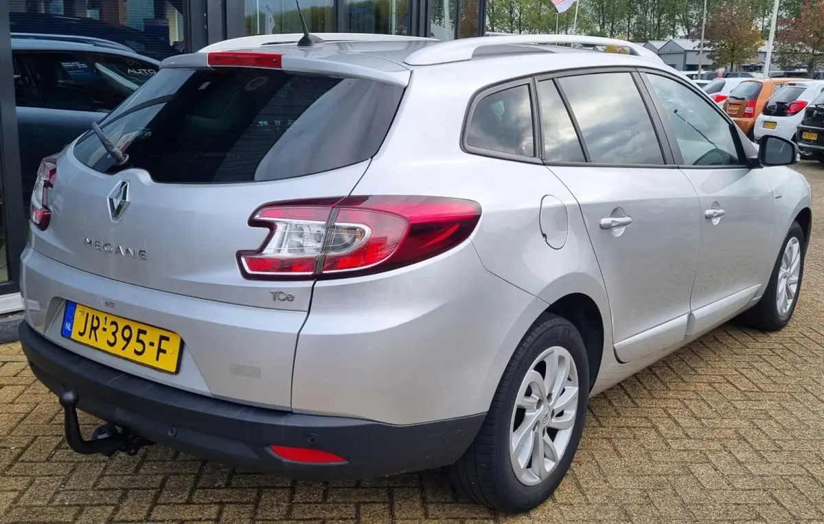 1.2 TCe Limited 116PK | NL AUTO | Nieuwe APK | Trekaak | Onderhoudshistorie | Navigatie | Cruise Control | Climate Control | Parkeersensoren | Getint Glas | 2 Sleutels |