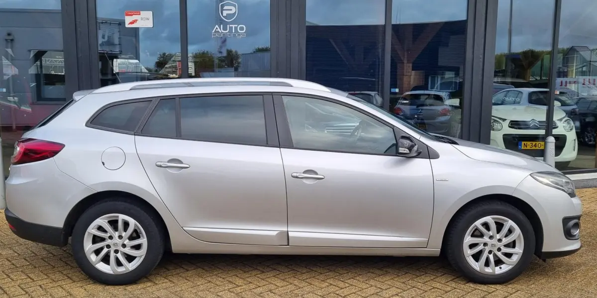 1.2 TCe Limited 116PK | NL AUTO | Nieuwe APK | Trekaak | Onderhoudshistorie | Navigatie | Cruise Control | Climate Control | Parkeersensoren | Getint Glas | 2 Sleutels |