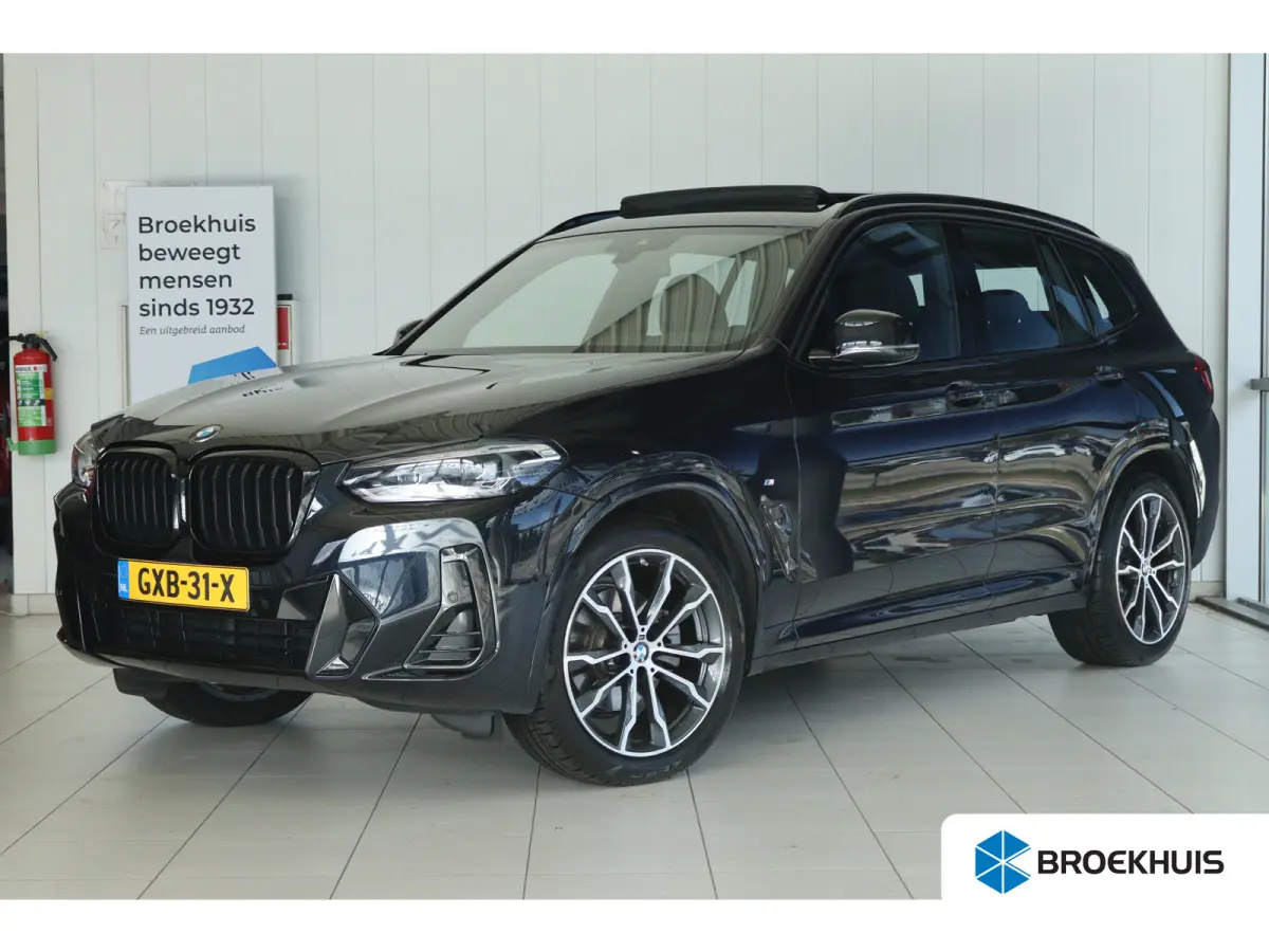 xDrive20i M-Sport Business Edition Plus | Cruise Control | Schuifdak | Camera | Stoelverwarming | HiFi | Leder | Navi | Carplay | Climate | Elektr. Klep | Keyless | 20 Inch