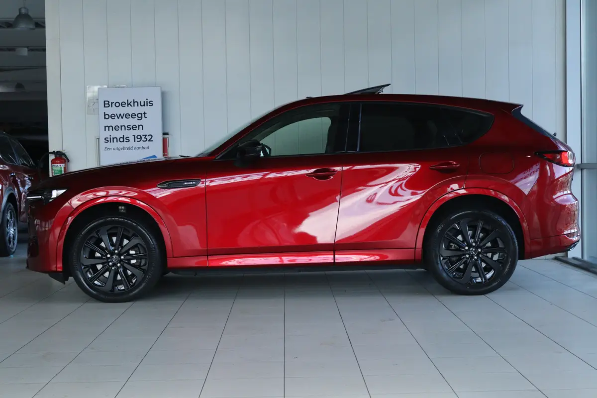 2.5 e-SkyActiv PHEV Homura Plus | SOH 91% | Adapt. Cruise | Trekhaak | Stoelventilatie | BOSE | Head-up | Memory | Schuifdak | 360 Camera | Navi | Carplay | Stoel+Stuurverwarming |