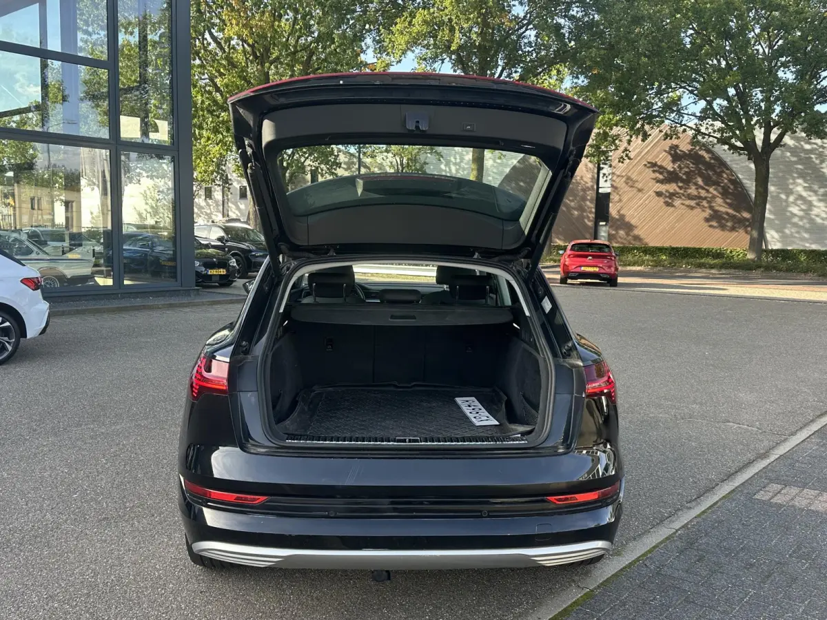 55 quattro Advanced edition Plus 95 kWh SOH 93% | MEM. STOEL | ELEK. STOELEN | ACHTERUITRIJ CAMERA | STOEL VERWARMING | 21'' WIELEN | RIJKLAAR MET 12 MND BOVAG GARANTIE | AFNM. TREKHAAK | PA