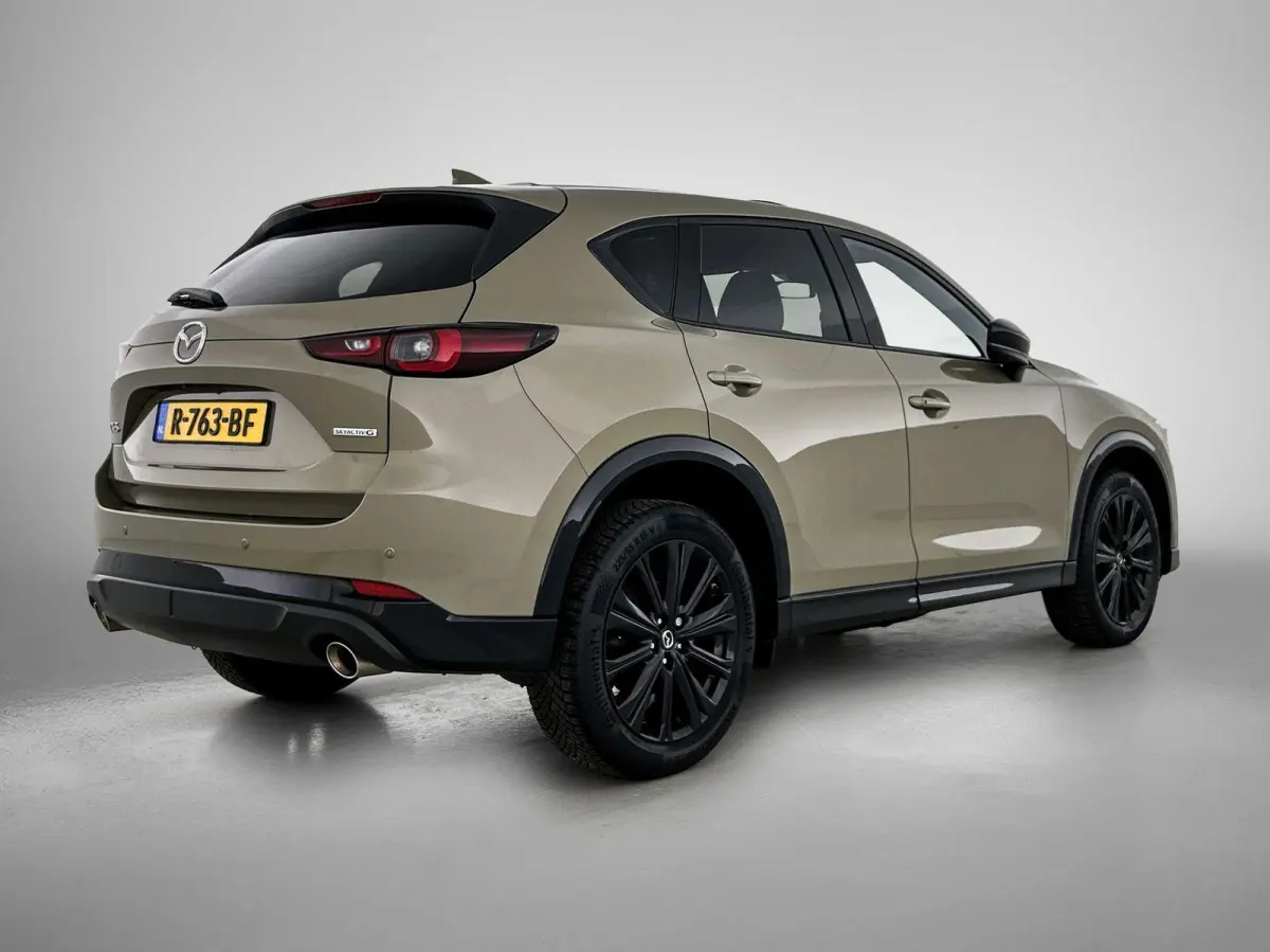 2.5 SkyActiv-G 194 Sportive | Navigatie | Leder | Trekhaak | Camera | Black Pakket | Airco | All-Wheater banden | Panorama dak |