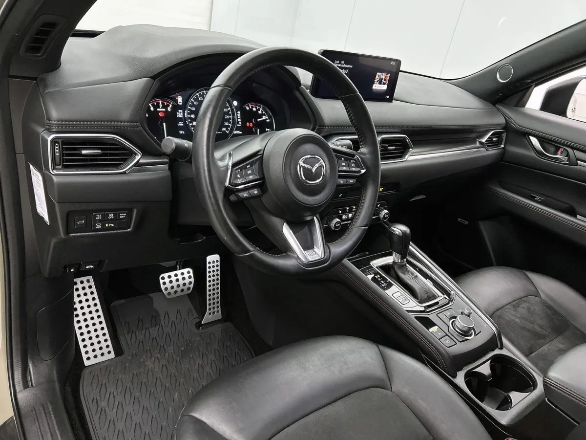 2.5 SkyActiv-G 194 Sportive | Navigatie | Leder | Trekhaak | Camera | Black Pakket | Airco | All-Wheater banden | Panorama dak |