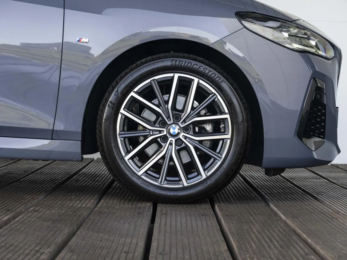 218i | M Sportpakket | Comfort Access | Panoramadak | Driving Assistant Plus | Head Up Display | Adaptief onderstel | Trekhaak