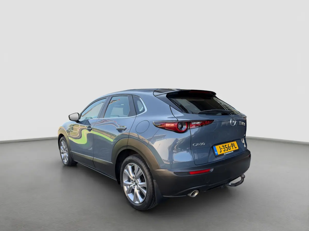 2.0 180pk SkyActiv-X M Hybrid Comfort Automaat | Trekhaak | Camera | Climate controle | Adaptive cruise controle | Dodehoek detectie | Elektrische achterklep | Keyless entry | Sensoren voor 