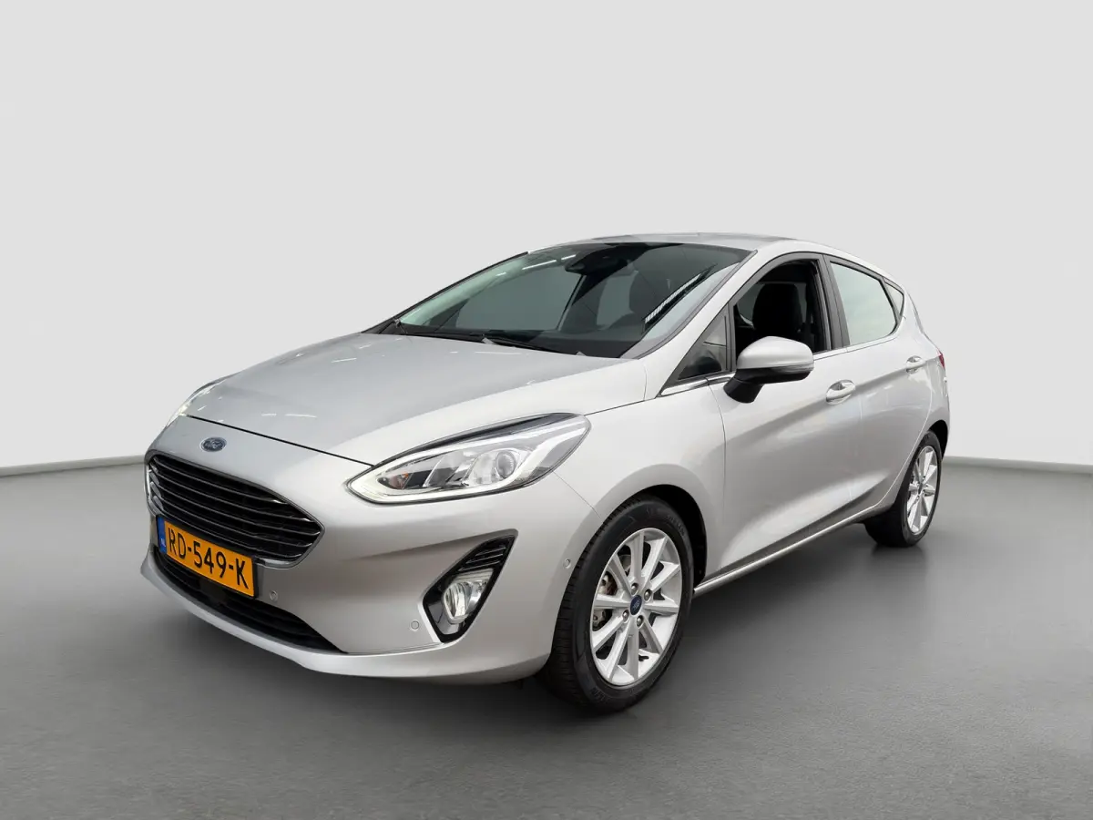 1.0 100pk EcoBoost Titanium | Camera | Adaptive cruise controle | B&O Audio | Voorruitverwarming | Carplay | Parkeersensoren voor en achter | Navigatie | Climate controle