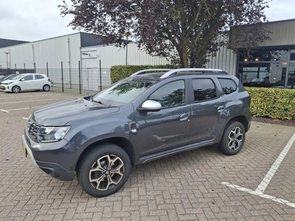 1.2 TCe Prestige | ACHTERUITRIJCAMERA | STOELVERWARMING | NAVIGATIE | AIRCO | PARKEERSENSOREN | 17" LICHTMETALEN VELGEN |