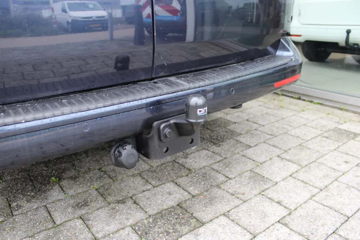 2.0 TDI L2H1 4Motion Highline 204pk | Trekhaak | Bijrijdersbank | Achteruitrijcamera | Cruise control | Navi | 18"LMV | Lades in laadruimte