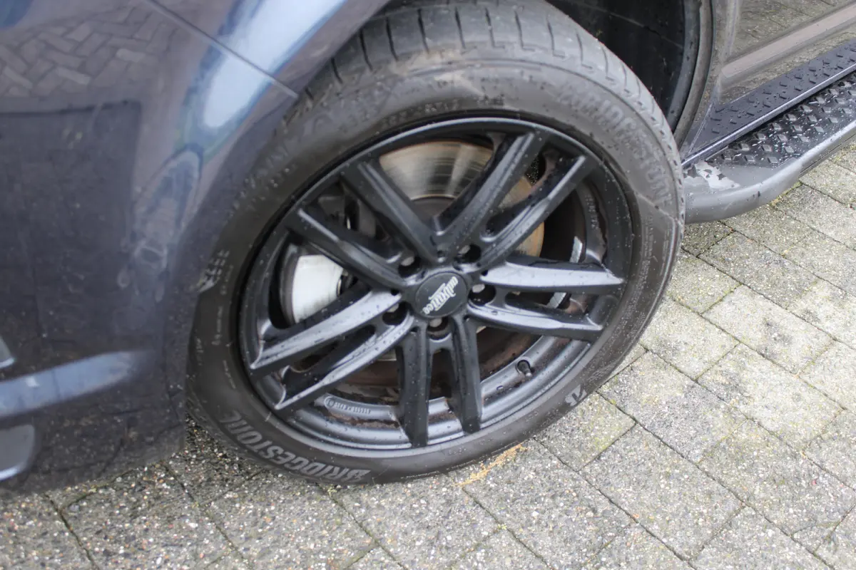 2.0 TDI L2H1 4Motion Highline 204pk | Trekhaak | Bijrijdersbank | Achteruitrijcamera | Cruise control | Navi | 18"LMV | Lades in laadruimte