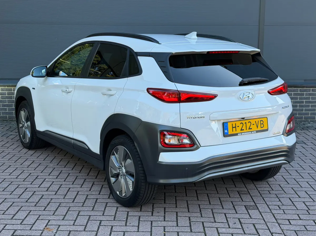 EV Premium 64 kWh | Stuur & Stoelverwarming | 3 Fase | Navigatie | Dealer Onderhouden | Achteruitrijcamera | | Achteruitrijcamera | Apple Carplay/Android Auto|telefoonintegratie premium | Au