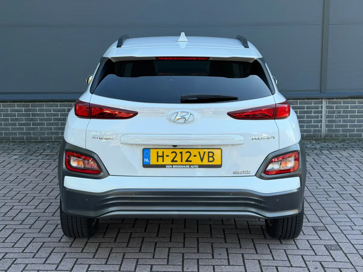 EV Premium 64 kWh | Stuur & Stoelverwarming | 3 Fase | Navigatie | Dealer Onderhouden | Achteruitrijcamera | | Achteruitrijcamera | Apple Carplay/Android Auto|telefoonintegratie premium | Au