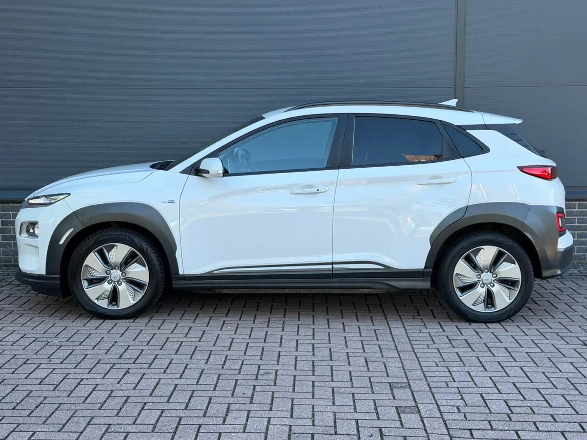 EV Premium 64 kWh | Stuur & Stoelverwarming | 3 Fase | Navigatie | Dealer Onderhouden | Achteruitrijcamera | | Achteruitrijcamera | Apple Carplay/Android Auto|telefoonintegratie premium | Au