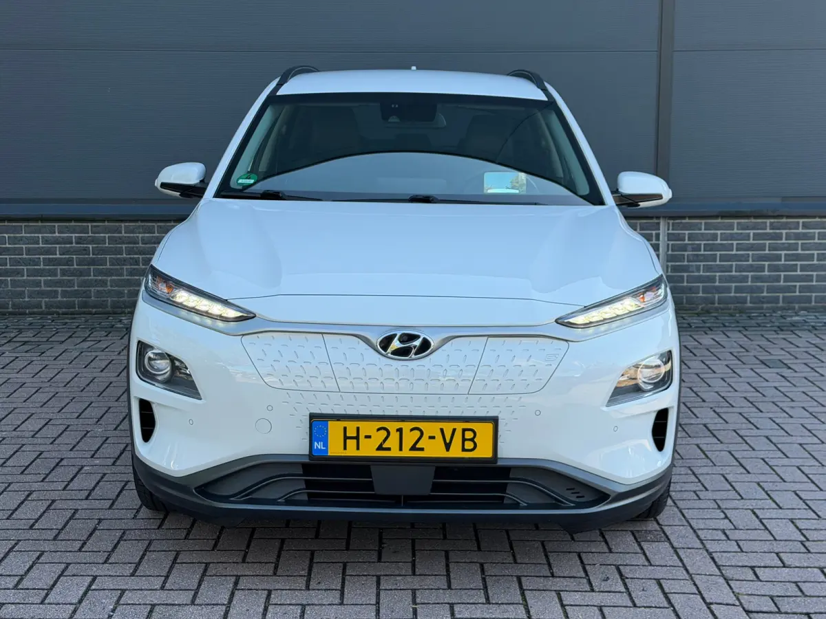 EV Premium 64 kWh | Stuur & Stoelverwarming | 3 Fase | Navigatie | Dealer Onderhouden | Achteruitrijcamera | | Achteruitrijcamera | Apple Carplay/Android Auto|telefoonintegratie premium | Au