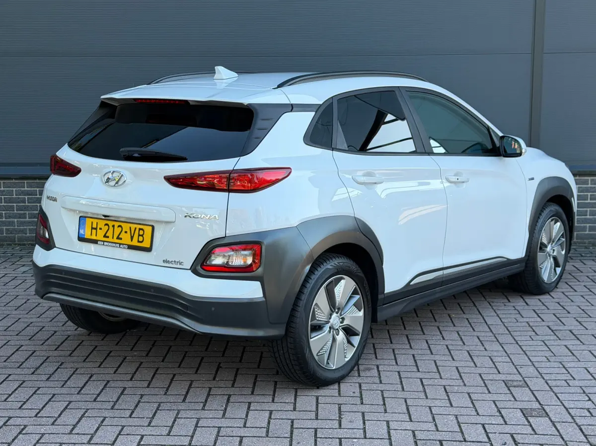 EV Premium 64 kWh | Stuur & Stoelverwarming | 3 Fase | Navigatie | Dealer Onderhouden | Achteruitrijcamera | | Achteruitrijcamera | Apple Carplay/Android Auto|telefoonintegratie premium | Au