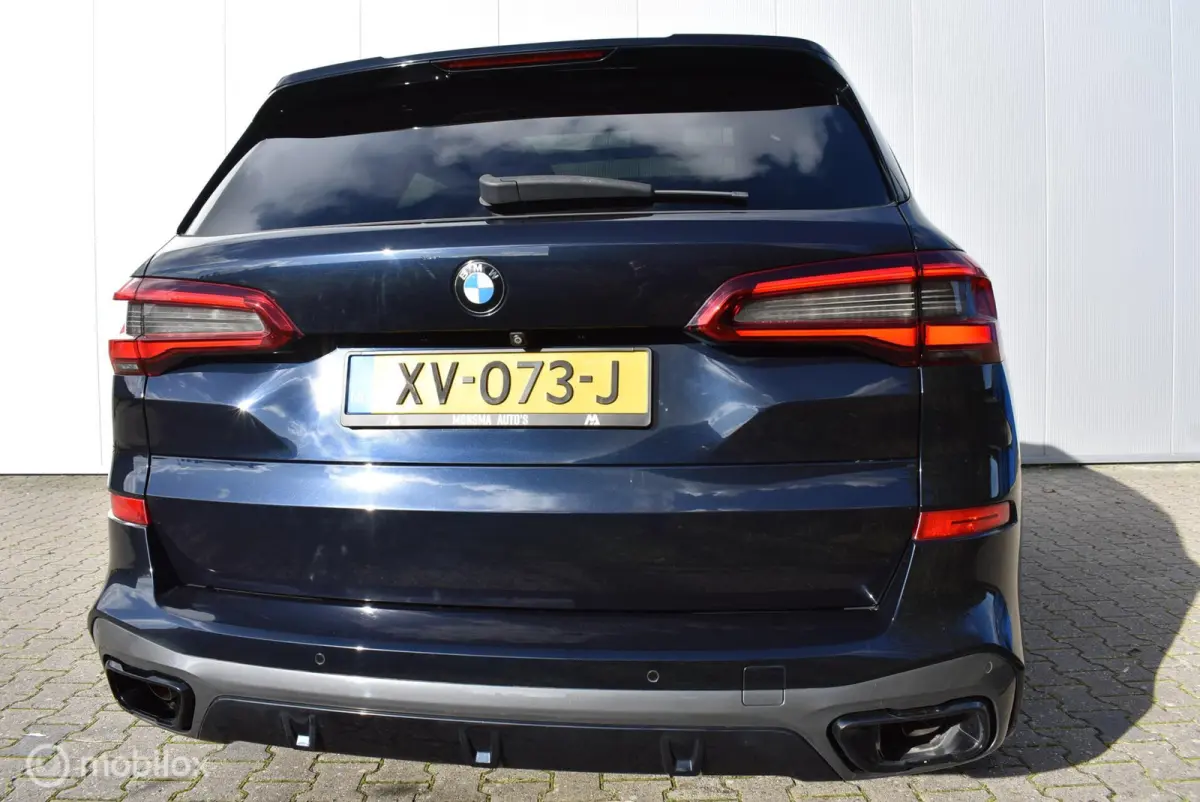 xDrive40i M-Sport Carbonschwarz Skylounge 4WS Luchtvering