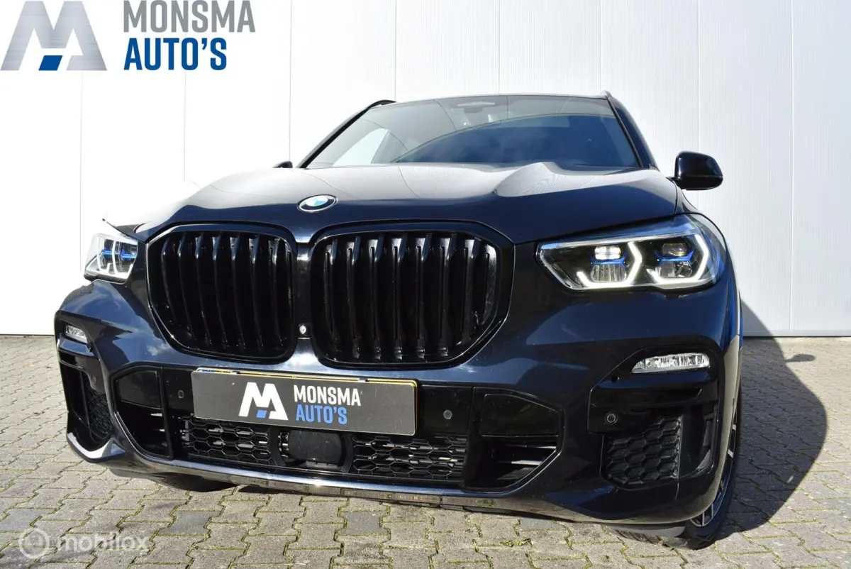 xDrive40i M-Sport Carbonschwarz Skylounge 4WS Luchtvering