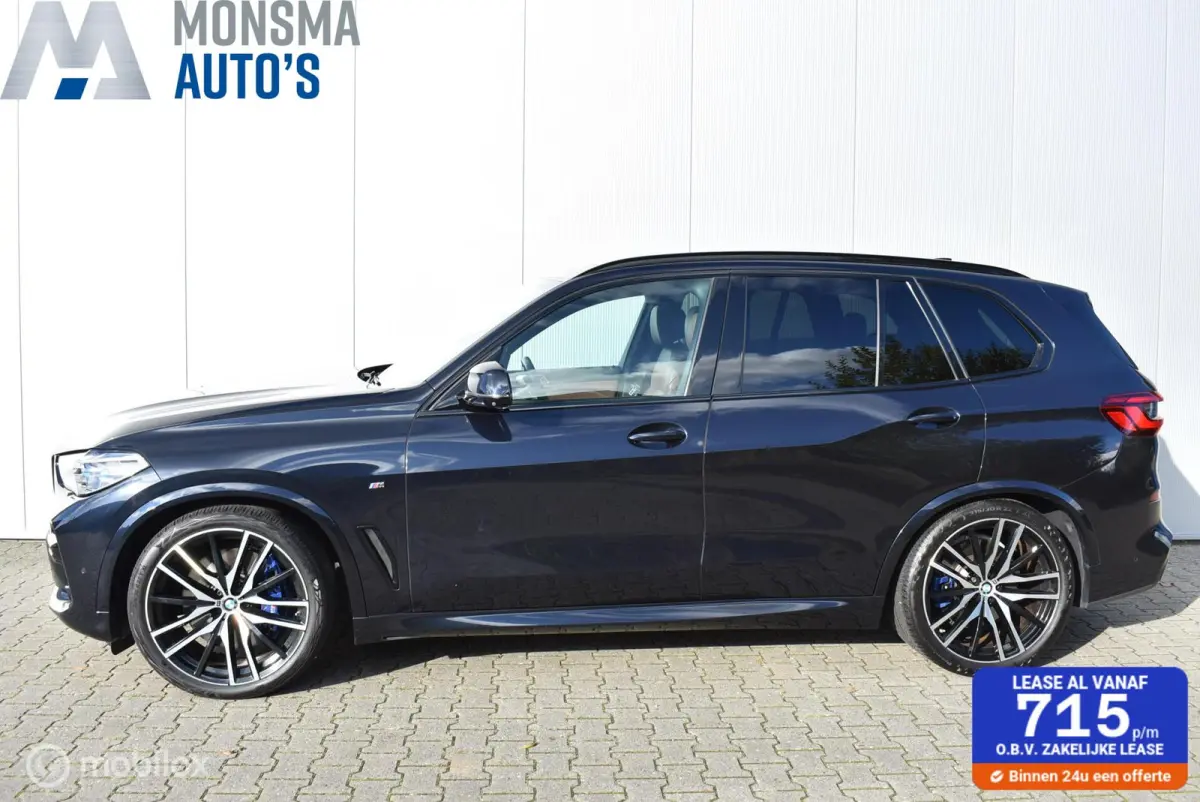 xDrive40i M-Sport Carbonschwarz Skylounge 4WS Luchtvering
