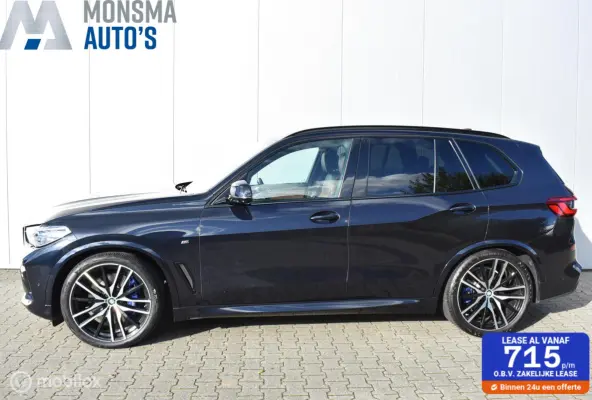 xDrive40i M-Sport Carbonschwarz Skylounge 4WS Luchtvering