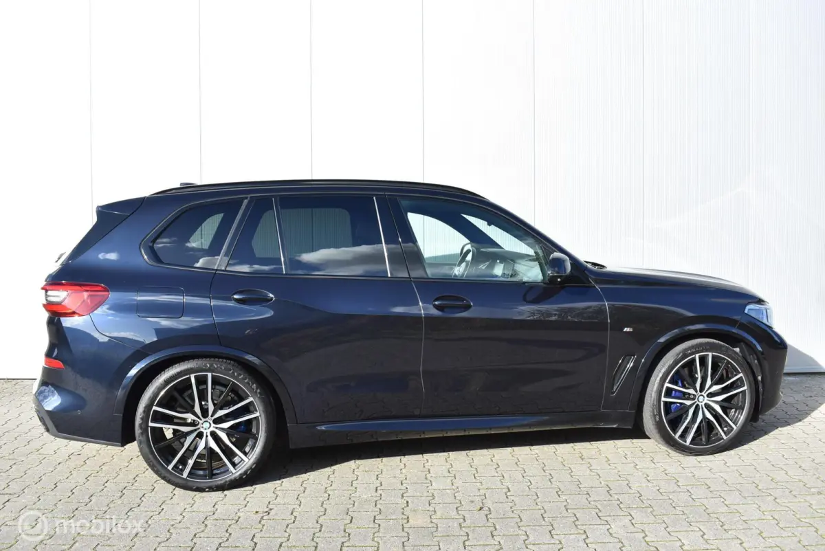 xDrive40i M-Sport Carbonschwarz Skylounge 4WS Luchtvering