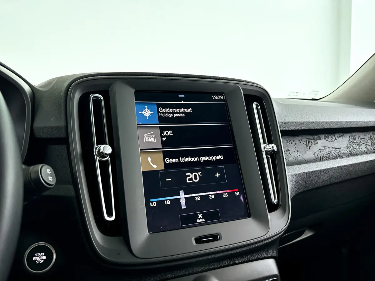 T2 Momentum | Park assist | Cruise control | Climate control | Navigatie