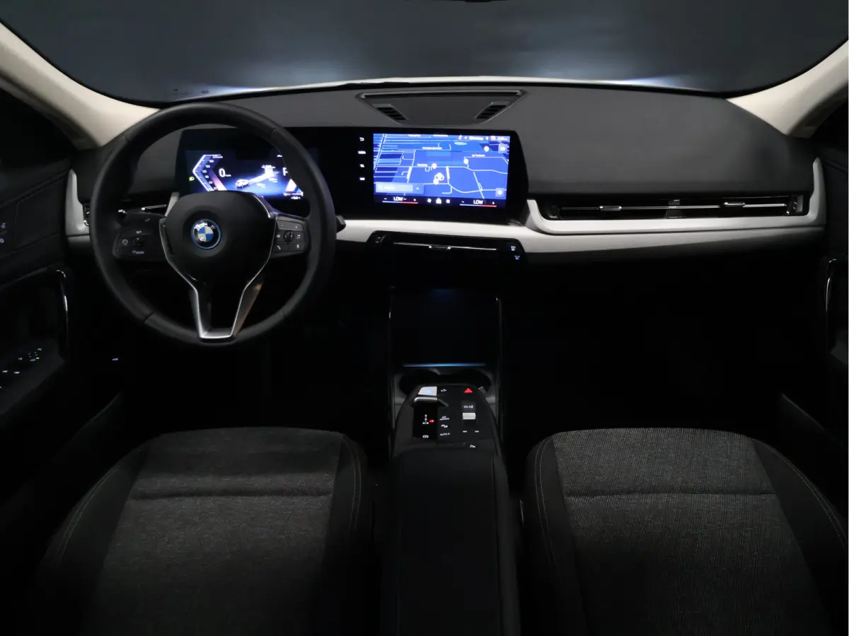 eDrive20 67 kWh [APPLE CARPLAY, ANDROID, CRUISE CONTROL, DIGITAL DASH, CAMERA, PDC V+A, SPORT, CLIMATE CONTROL, ELEKTRISCHE ACHTERKLEP,  NAVIGATIE, BLUETOOTH, NIEUWSTAAT]