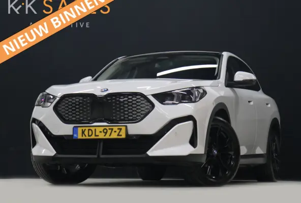 eDrive20 67 kWh [APPLE CARPLAY, ANDROID, CRUISE CONTROL, DIGITAL DASH, CAMERA, PDC V+A, SPORT, CLIMATE CONTROL, ELEKTRISCHE ACHTERKLEP,  NAVIGATIE, BLUETOOTH, NIEUWSTAAT]