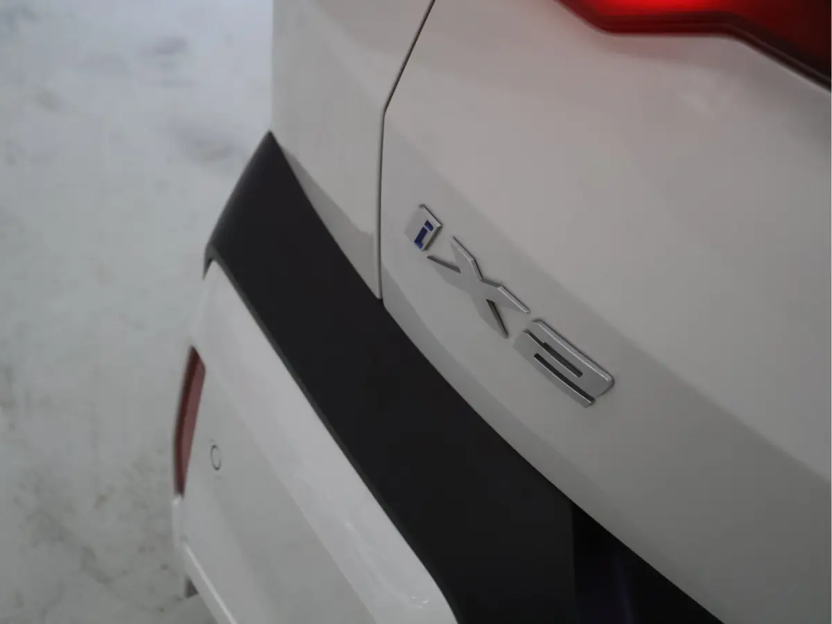 eDrive20 67 kWh [APPLE CARPLAY, ANDROID, CRUISE CONTROL, DIGITAL DASH, CAMERA, PDC V+A, SPORT, CLIMATE CONTROL, ELEKTRISCHE ACHTERKLEP,  NAVIGATIE, BLUETOOTH, NIEUWSTAAT]