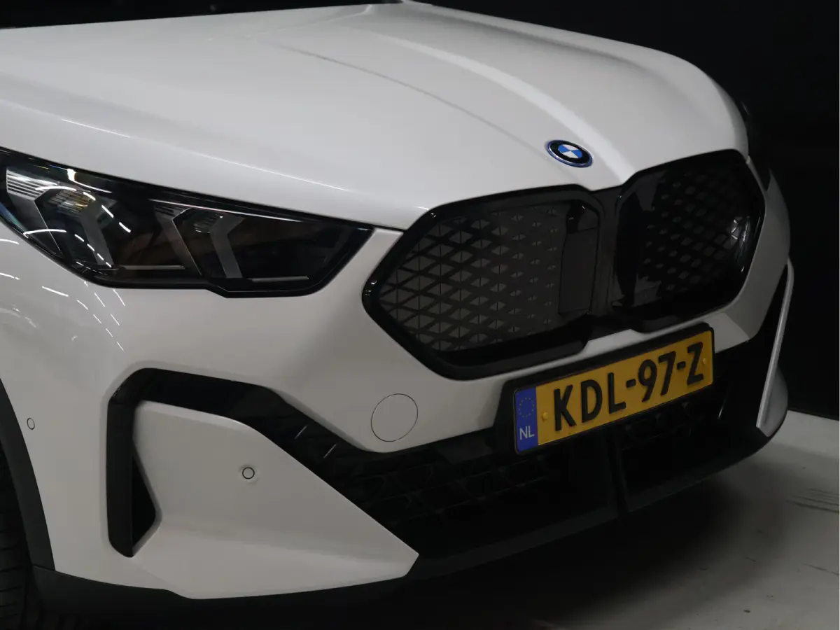 eDrive20 67 kWh [APPLE CARPLAY, ANDROID, CRUISE CONTROL, DIGITAL DASH, CAMERA, PDC V+A, SPORT, CLIMATE CONTROL, ELEKTRISCHE ACHTERKLEP,  NAVIGATIE, BLUETOOTH, NIEUWSTAAT]