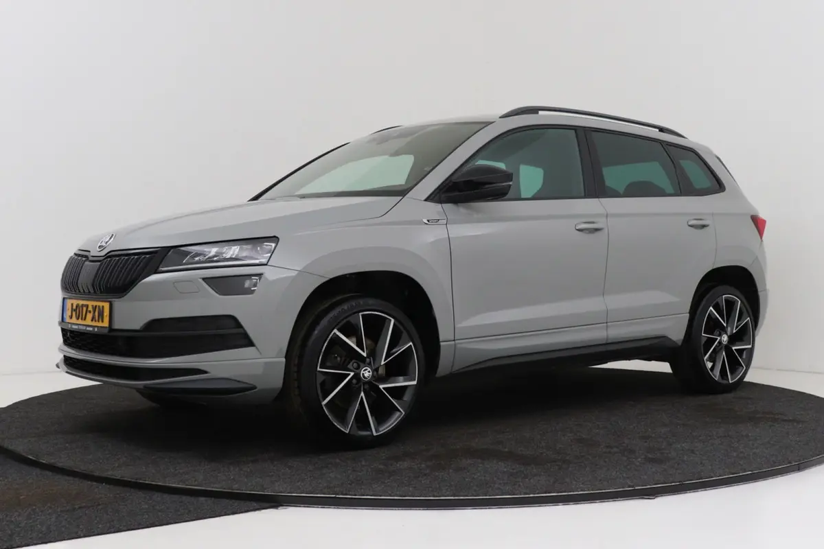 1.5 TSI Sportline Business | Uitklap Trekhaak | Org NL | CarPlay | Digital Cockpit | Camera | Stoelverwarming |