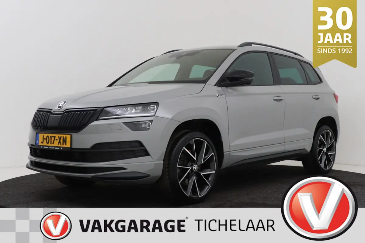 1.5 TSI Sportline Business | Uitklap Trekhaak | Org NL | CarPlay | Digital Cockpit | Camera | Stoelverwarming |