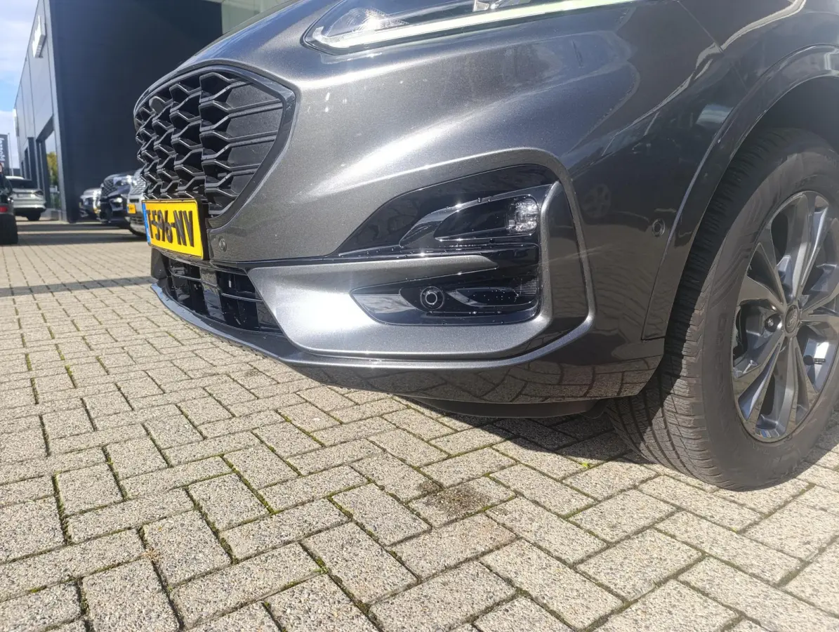2.5 PHEV ST-Line | Adaptieve Cruise | Elek. Achterklep | Dodehoeksensoren | Stoel/stuur voorruitverwarming | Camera voor + achter | Ford-onderhouden | Trekhaak