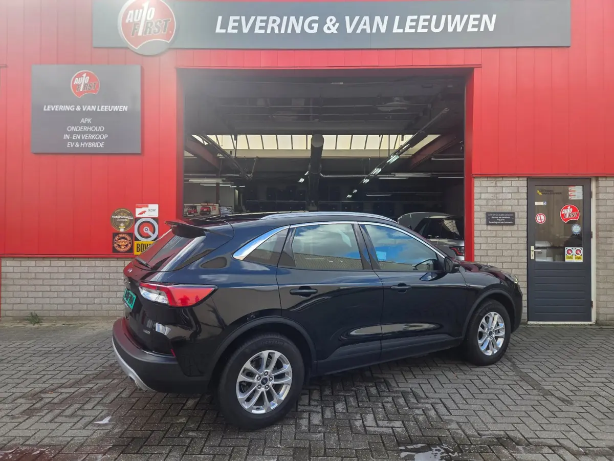 2.5 PHEV Titanium Navigatie/ Parkeersensoren V + A/ Stoelverwarming/ Rijklaarpijs!