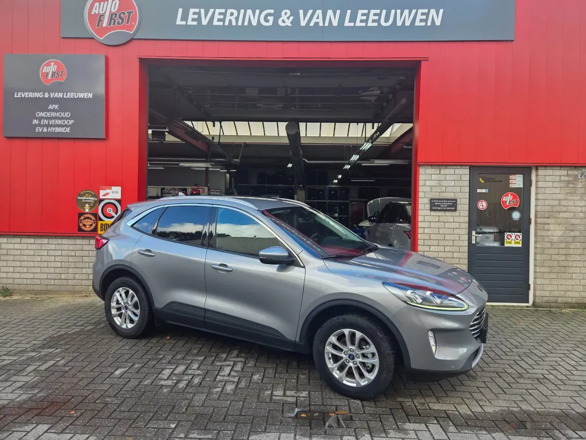 2.5 PHEV Titanium Winterpack/ Navigatie/ Parkeersensoren V + A/ Stoelverwarming/ Rijklaarpijs!