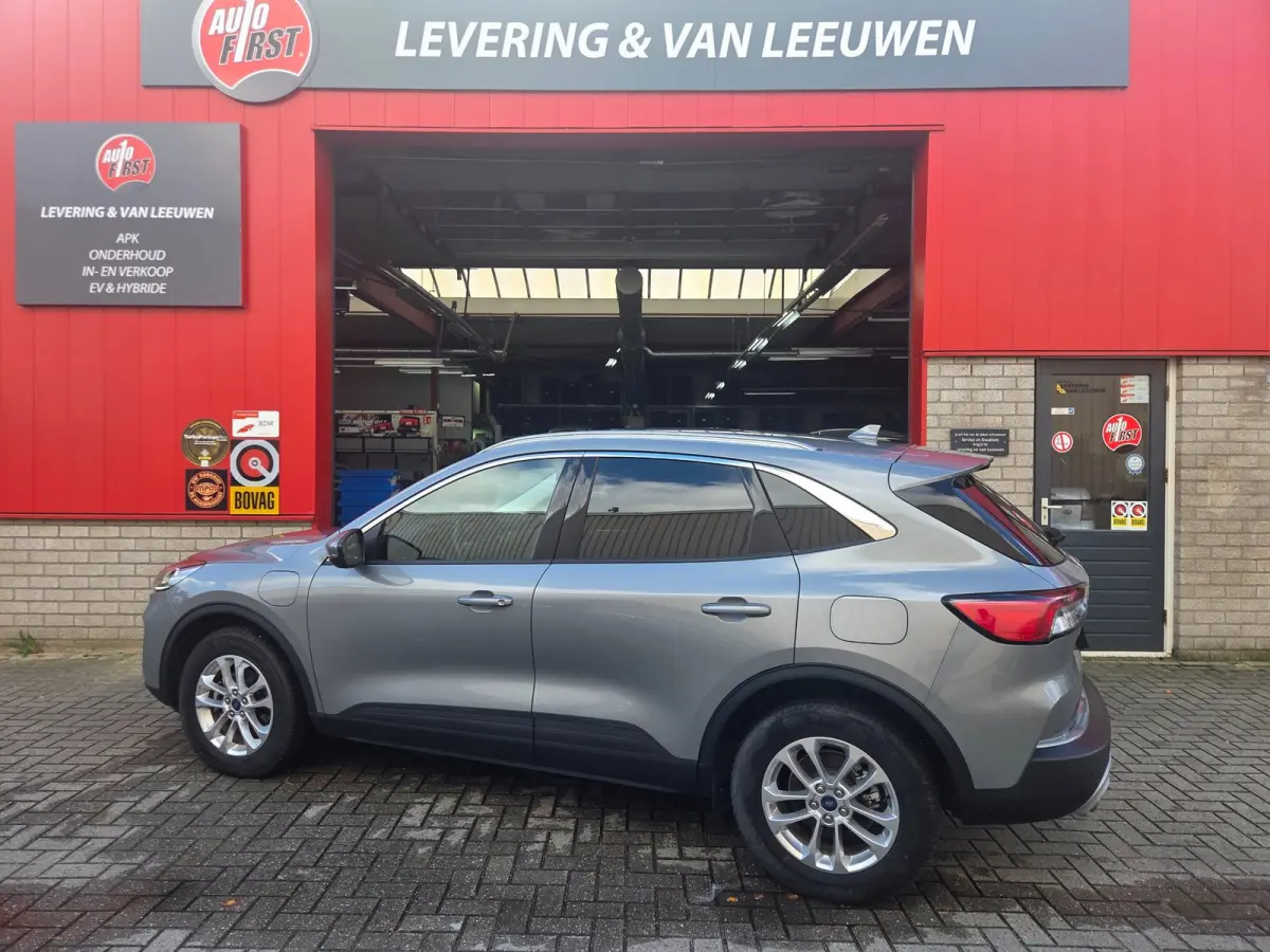 2.5 PHEV Titanium Winterpack/ Navigatie/ Parkeersensoren V + A/ Stoelverwarming/ Rijklaarpijs!