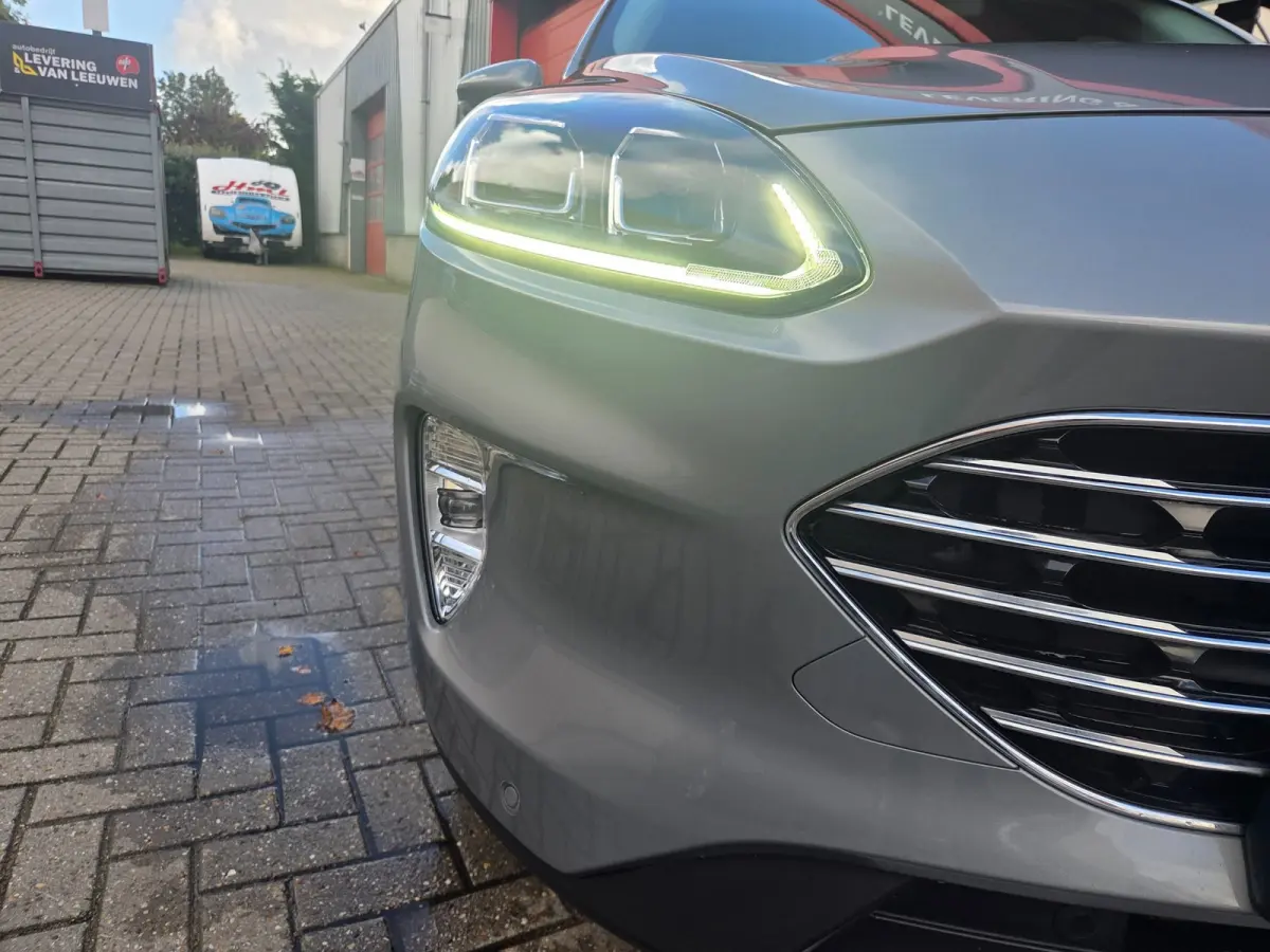 2.5 PHEV Titanium Winterpack/ Navigatie/ Parkeersensoren V + A/ Stoelverwarming/ Rijklaarpijs!