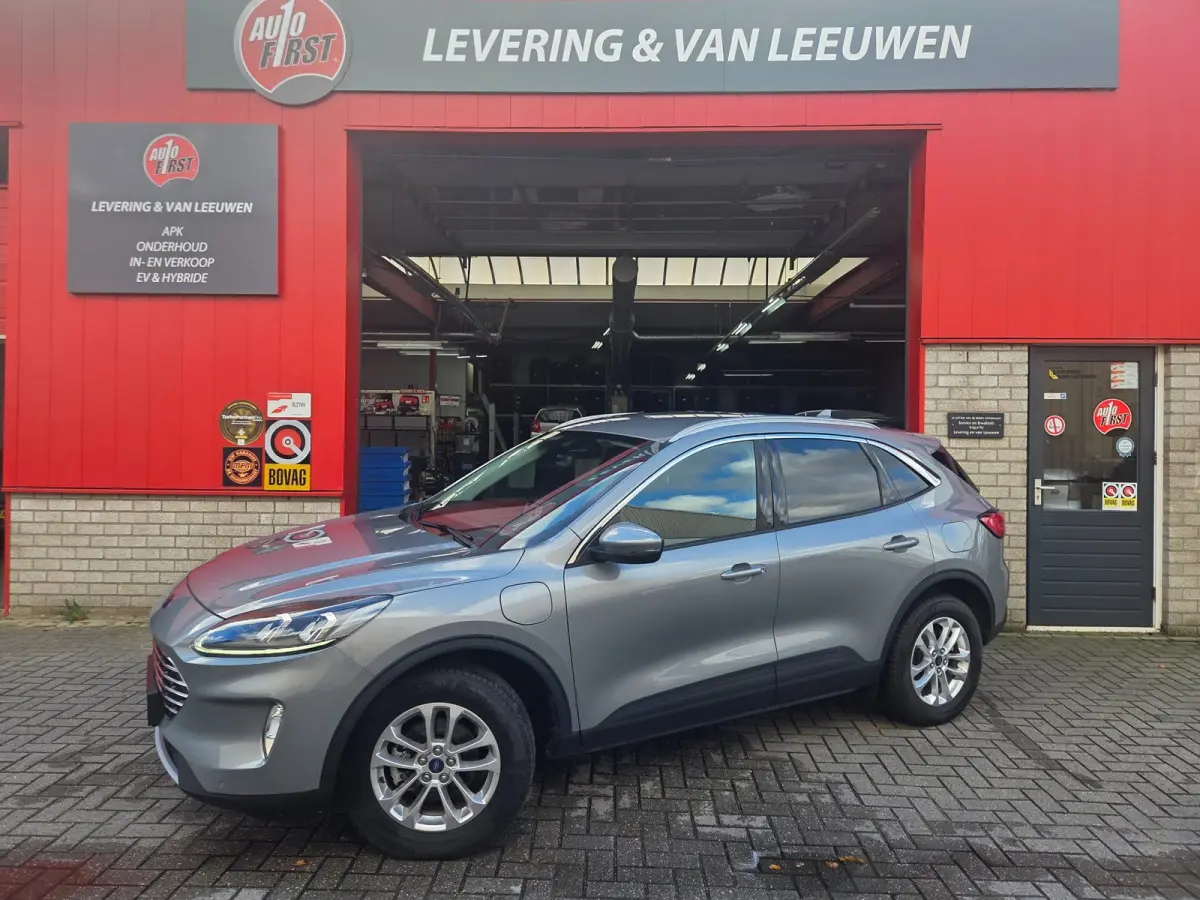 2.5 PHEV Titanium Winterpack/ Navigatie/ Parkeersensoren V + A/ Stoelverwarming/ Rijklaarpijs!