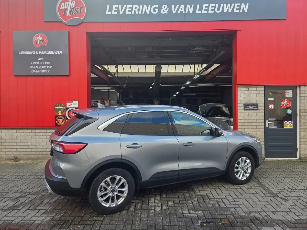2.5 PHEV Titanium Winterpack/ Navigatie/ Parkeersensoren V + A/ Stoelverwarming/ Rijklaarpijs!