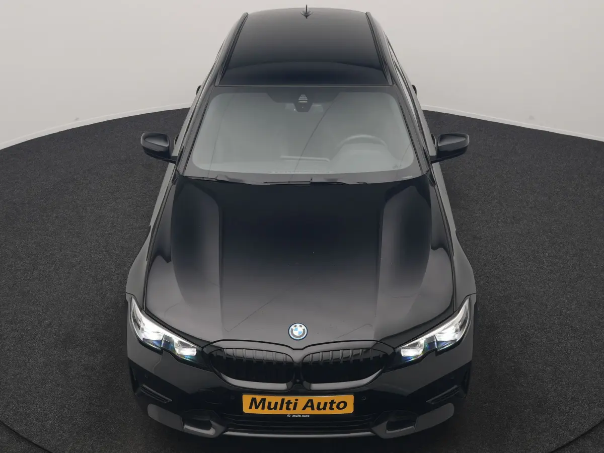 330e xDrive Sportline PHEV 293pk Dealer O.H | SOH 87,9% | Trekhaak Af Fabriek | Camera | Lederen Sportstoelen Verwarmd | Apple Carplay | Sfeerverlichting | Navigatie | Virtual | Cruise Contr