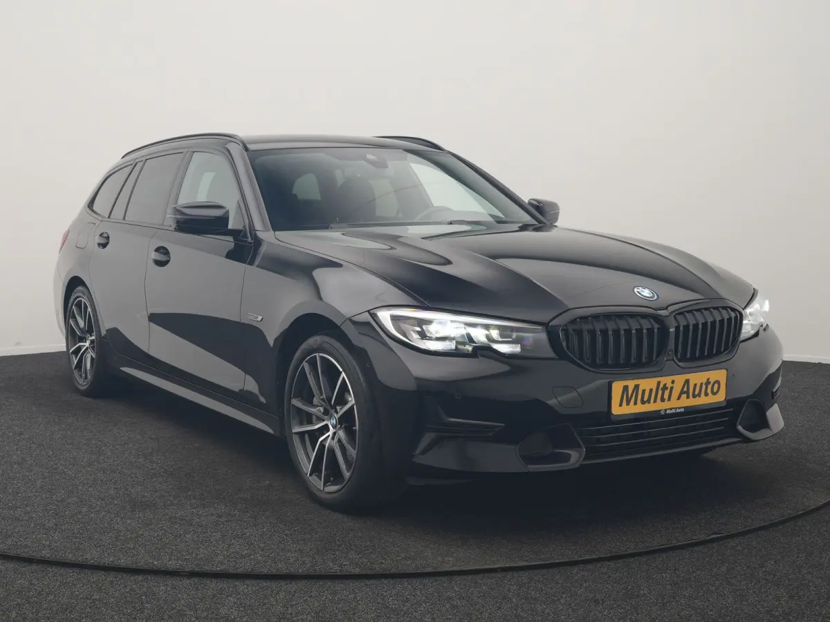 330e xDrive Sportline PHEV 293pk Dealer O.H | SOH 87,9% | Trekhaak Af Fabriek | Camera | Lederen Sportstoelen Verwarmd | Apple Carplay | Sfeerverlichting | Navigatie | Virtual | Cruise Contr