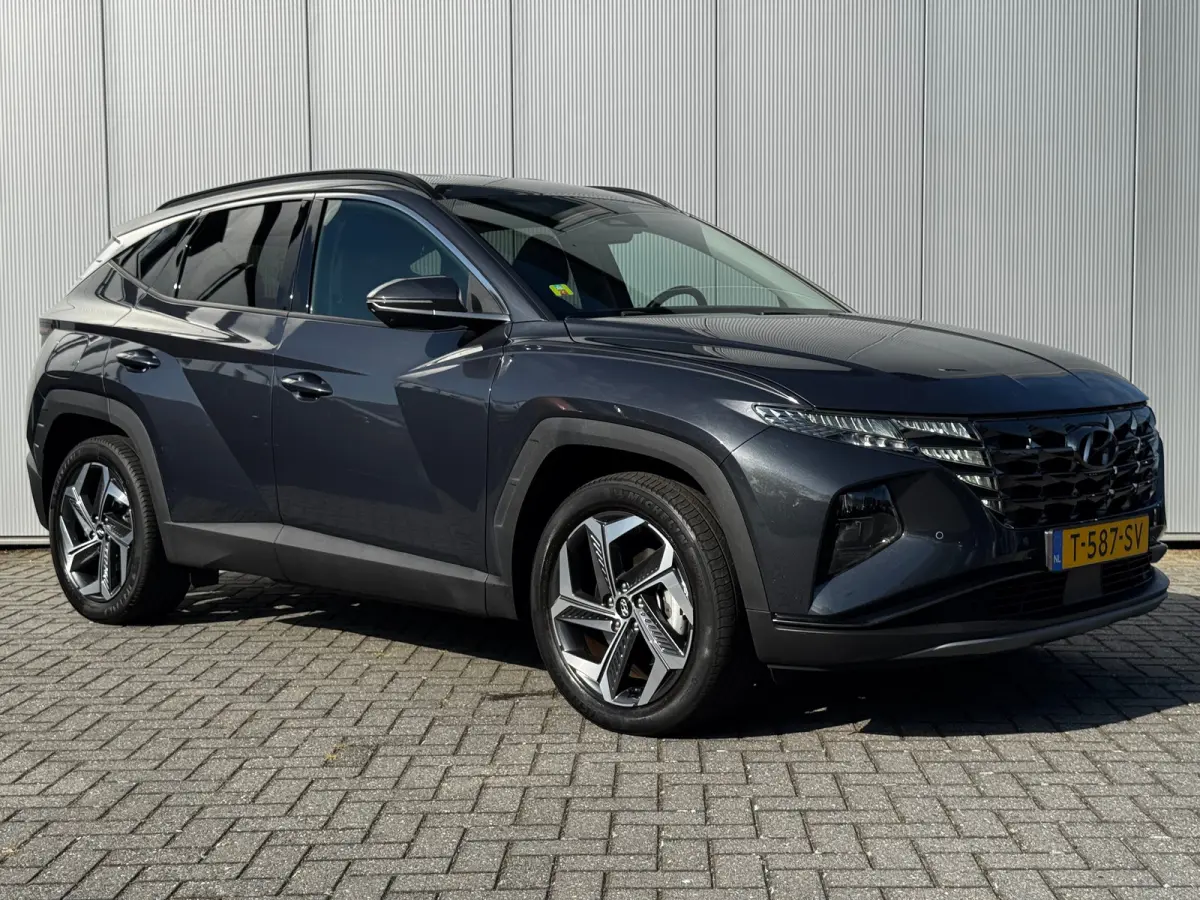 1.6 T-GDI 265pk PHEV Comfort Smart 4WD | Climate | Camera | Carplay | Keyless | Navigatie | Full - Led | Elek. Klep | Winterpakket | 19" Lichtmetaal | Krell Audio | Digitale Cockpit | Parkee