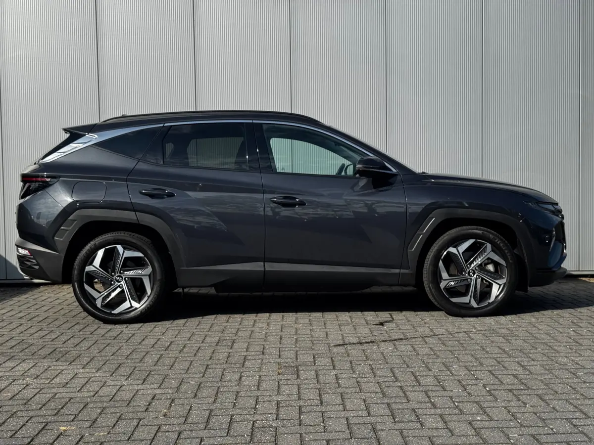 1.6 T-GDI 265pk PHEV Comfort Smart 4WD | Climate | Camera | Carplay | Keyless | Navigatie | Full - Led | Elek. Klep | Winterpakket | 19" Lichtmetaal | Krell Audio | Digitale Cockpit | Parkee