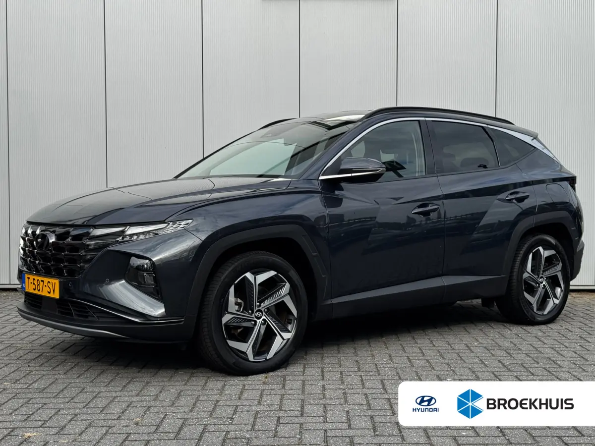 1.6 T-GDI 265pk PHEV Comfort Smart 4WD | Climate | Camera | Carplay | Keyless | Navigatie | Full - Led | Elek. Klep | Winterpakket | 19" Lichtmetaal | Krell Audio | Digitale Cockpit | Parkee