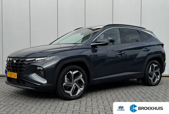 1.6 T-GDI 265pk PHEV Comfort Smart 4WD | Climate | Camera | Carplay | Keyless | Navigatie | Full - Led | Elek. Klep | Winterpakket | 19" Lichtmetaal | Krell Audio | Digitale Cockpit | Parkee