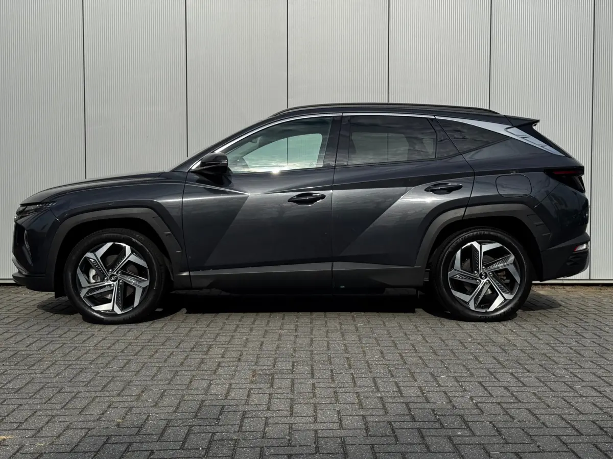 1.6 T-GDI 265pk PHEV Comfort Smart 4WD | Climate | Camera | Carplay | Keyless | Navigatie | Full - Led | Elek. Klep | Winterpakket | 19" Lichtmetaal | Krell Audio | Digitale Cockpit | Parkee