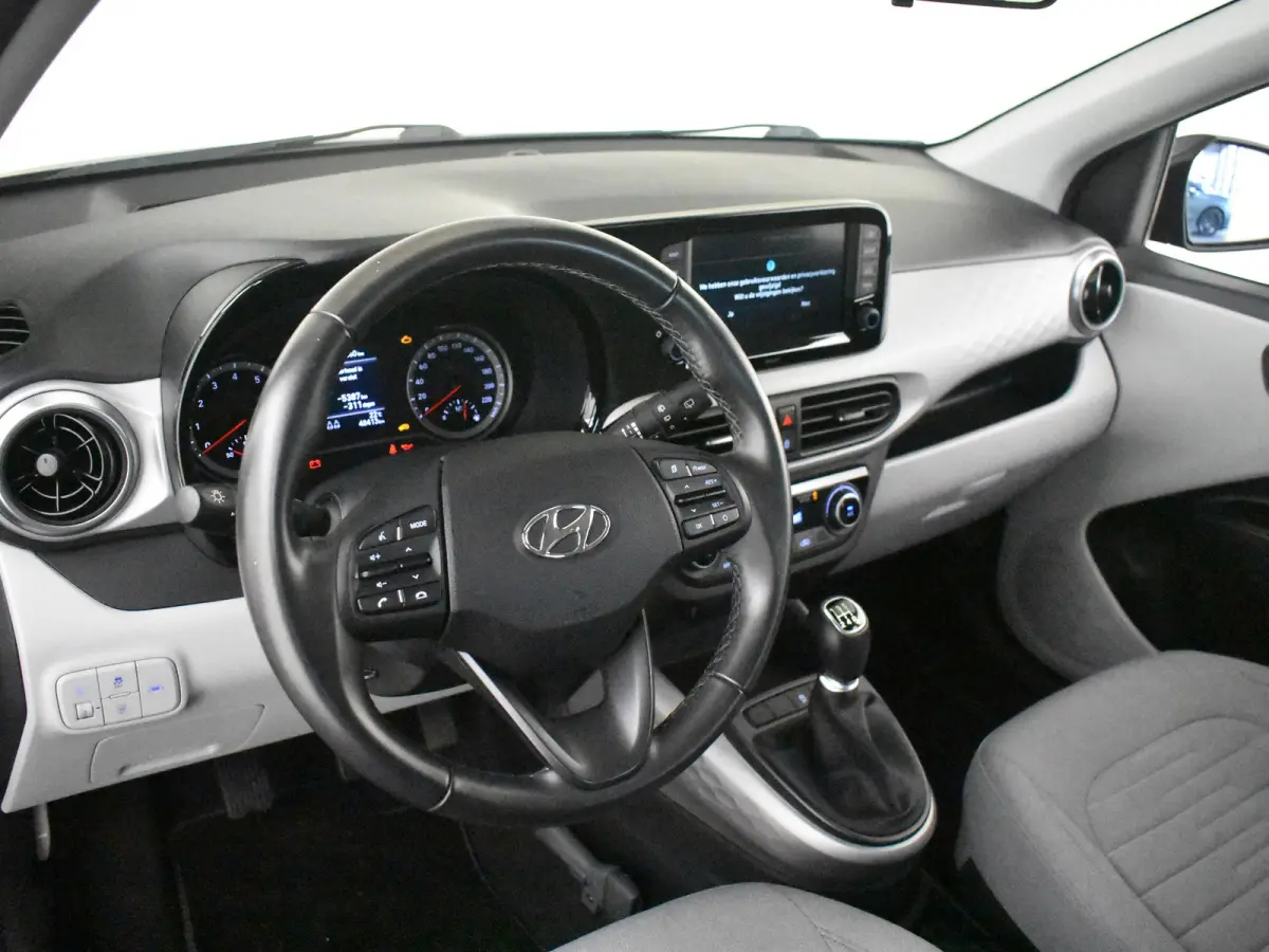 1.0 Premium l Camera l Automatische Airco l Parkeersensoren l Navigatie l Elektr. Pakket l